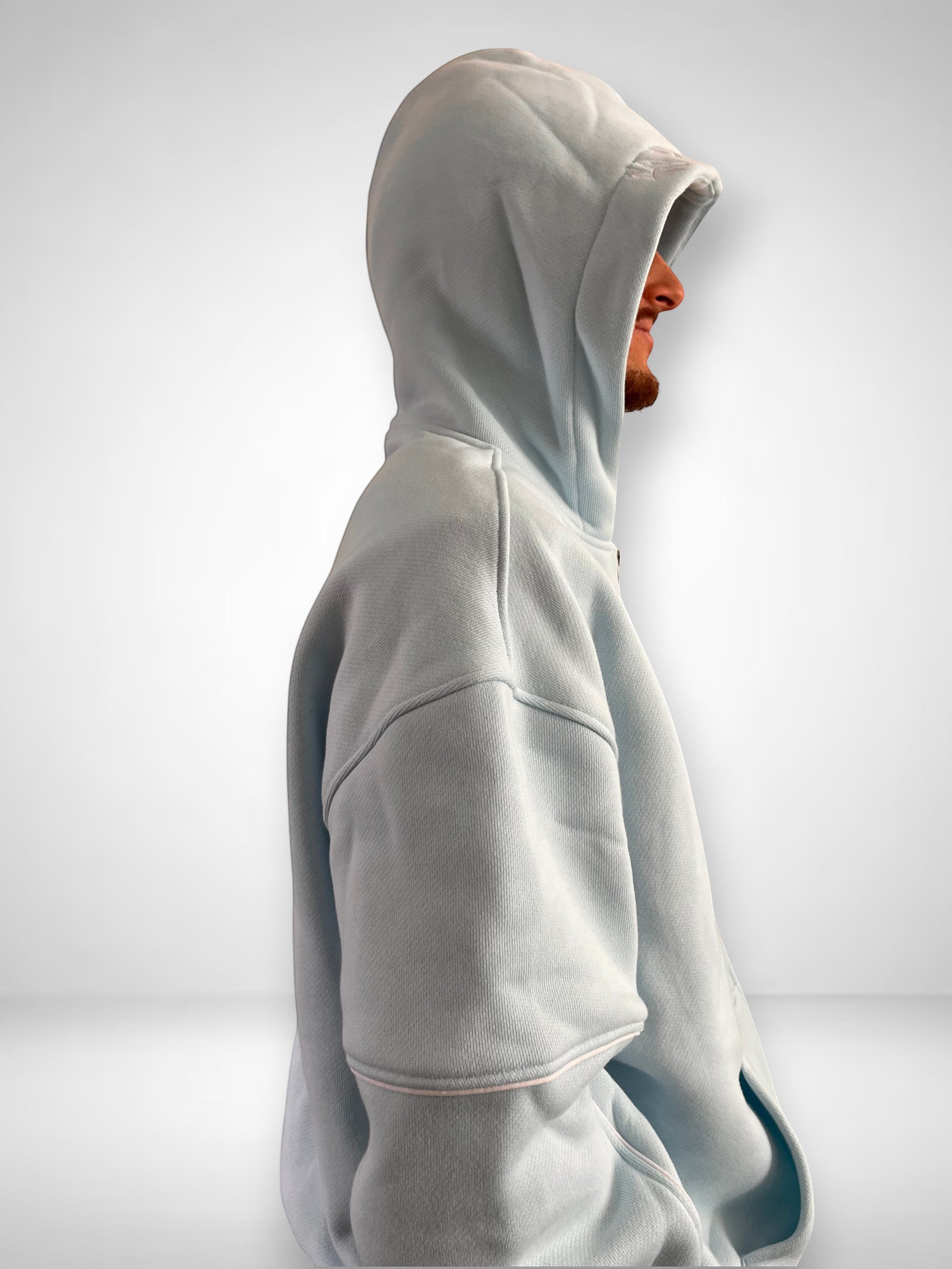 SLAYZ light blue cotton blend hoodie with a relaxed fit, full zip, hood, and pockets. Ideal for casual wear.