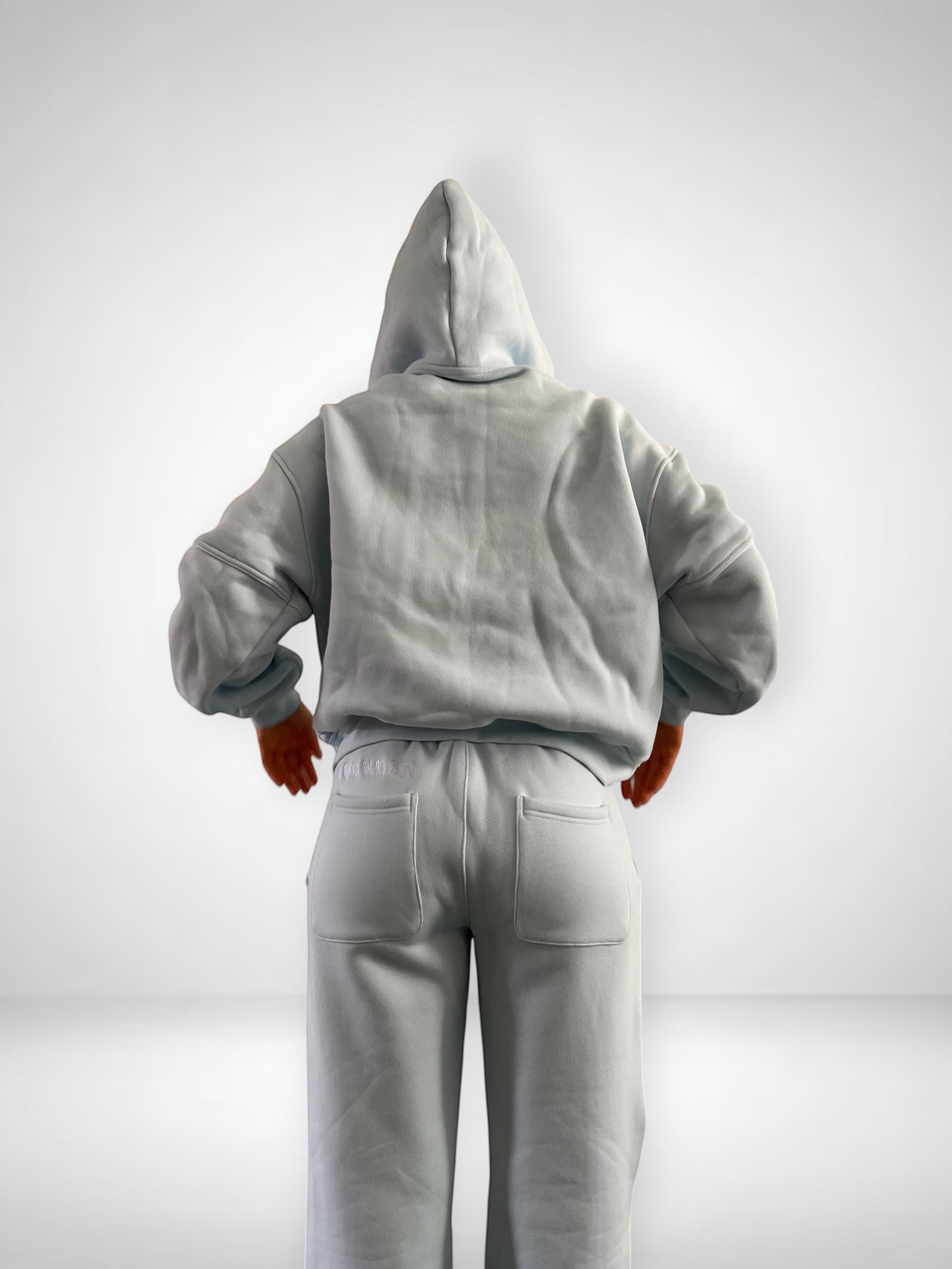 SLAYZ light blue cotton blend oversized jogging suit with zip-up hoodie and wide-leg pants.
