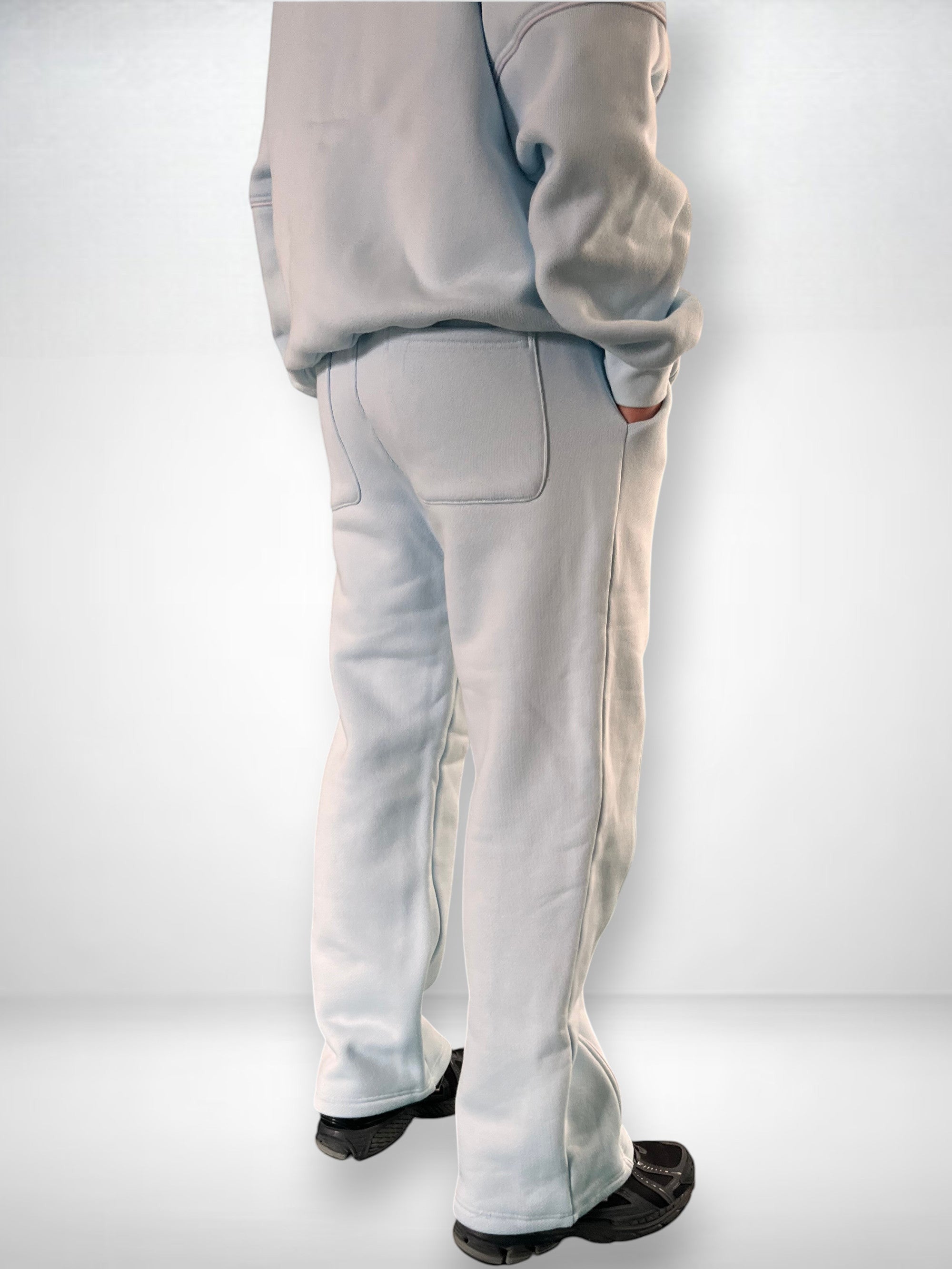 SLAYZ light blue cotton blend oversized jogging suit with wide leg pants and zip-up hoodie. Features contrast stitching and embroidered logo.