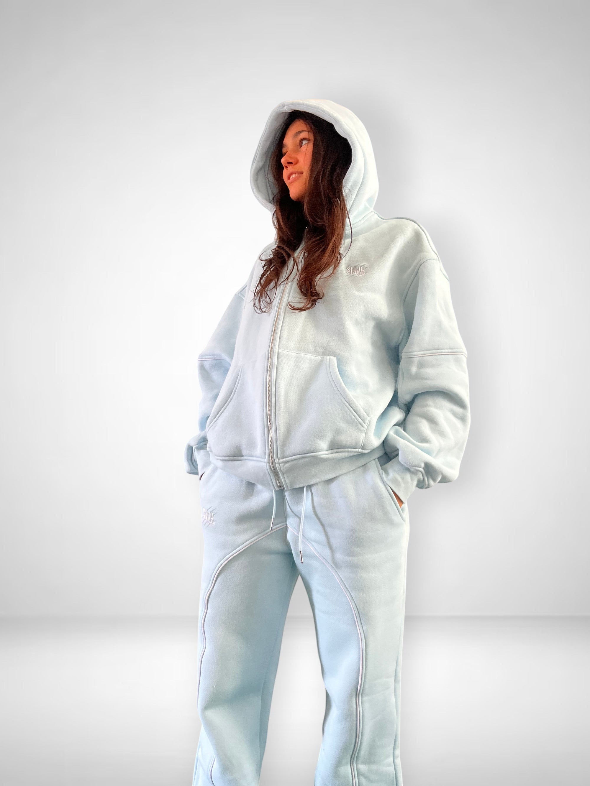 SLAYZ light blue oversized cotton blend zip-up hoodie and matching joggers with contrast stitching and embroidered logo.