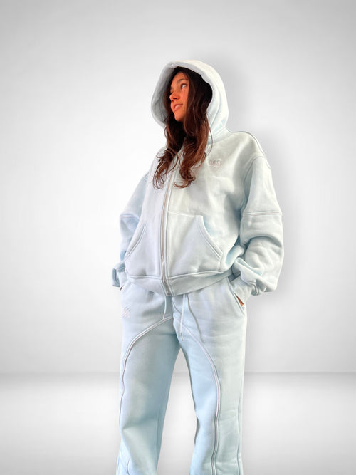 SLAYZ light blue oversized cotton blend zip-up hoodie and matching joggers with contrast stitching and embroidered logo.