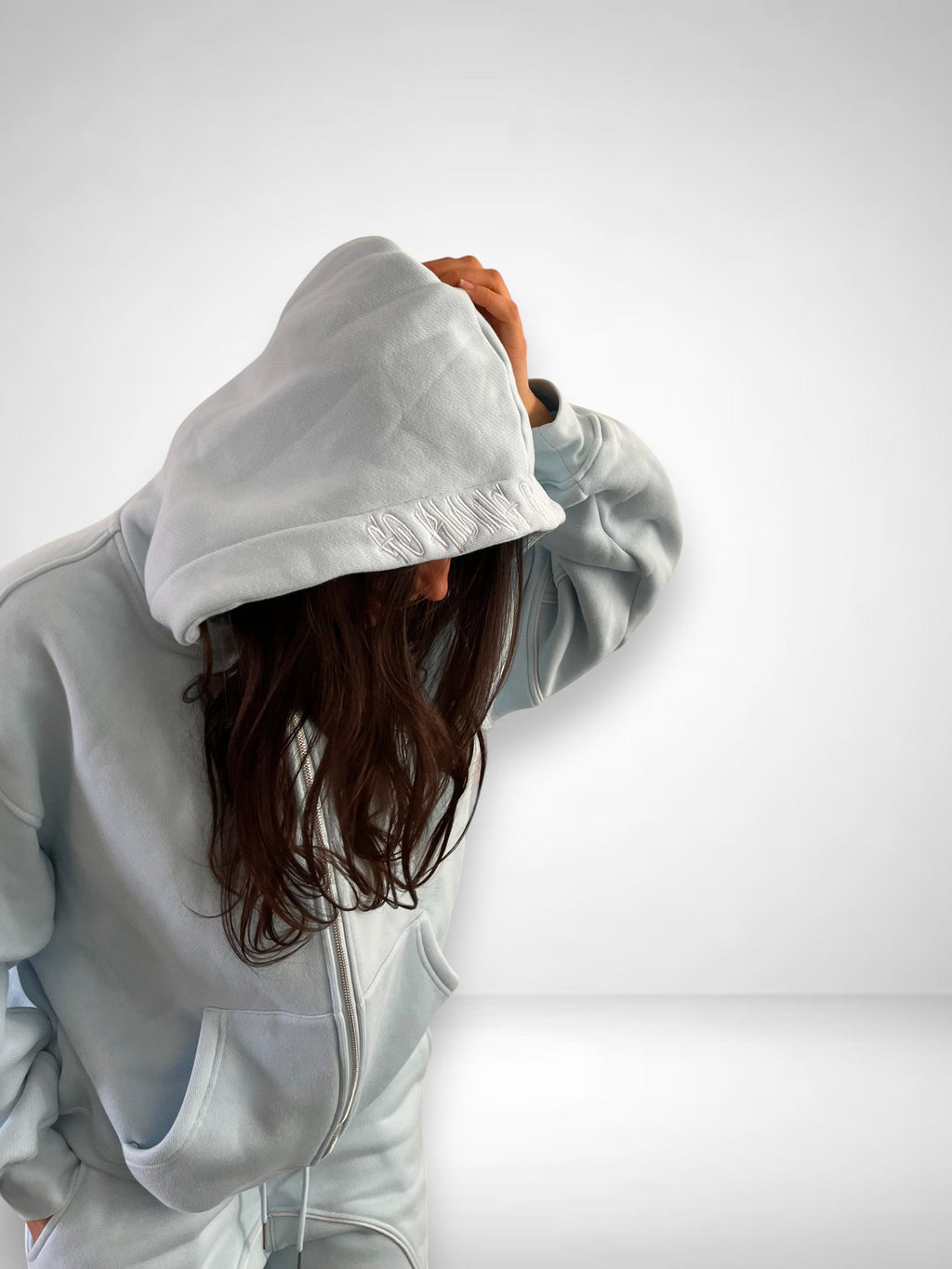 SLAYZ light blue oversized cotton blend zip-up hoodie and matching joggers with embroidered logo detail.