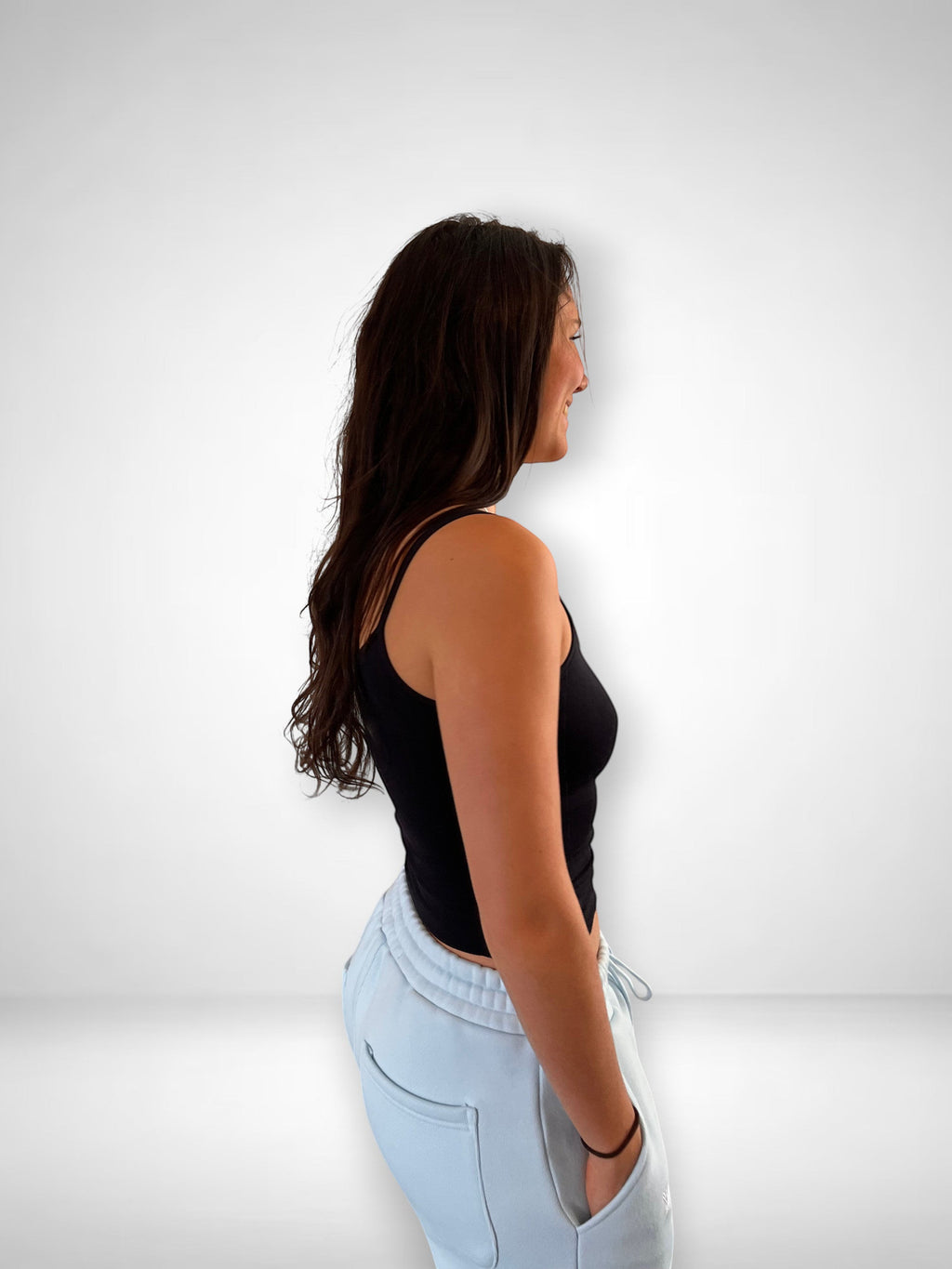 SLAYZ light blue relaxed fit sweatpants with drawstring waist and pockets, worn by a woman.