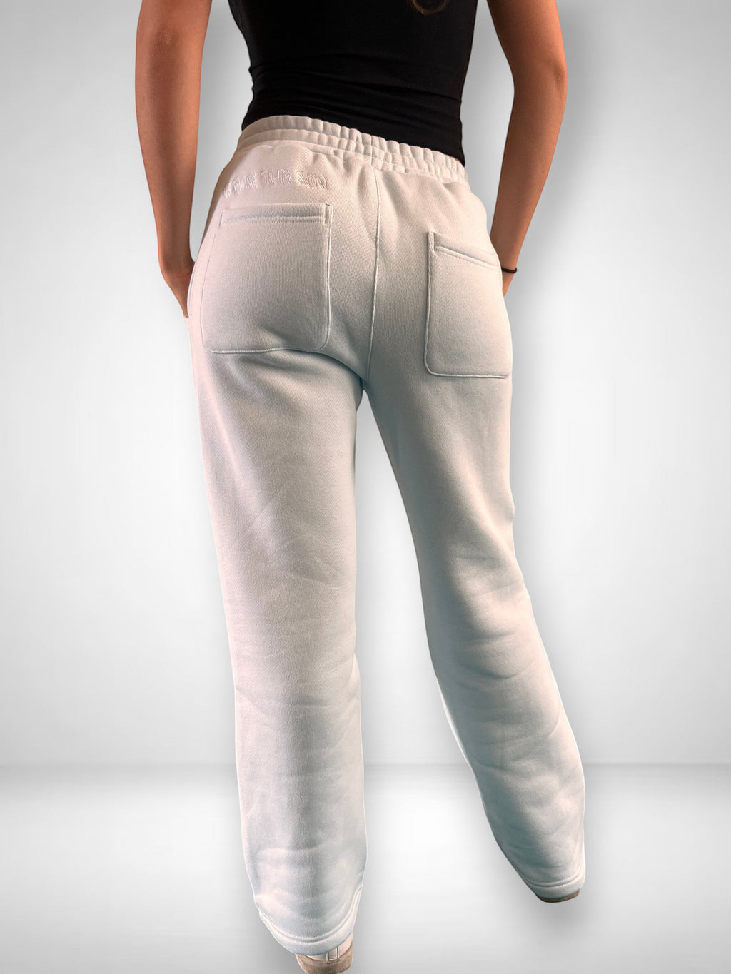 SLAYZ light blue relaxed fit sweatpants with drawstring waist and two back pockets, made from soft fabric.