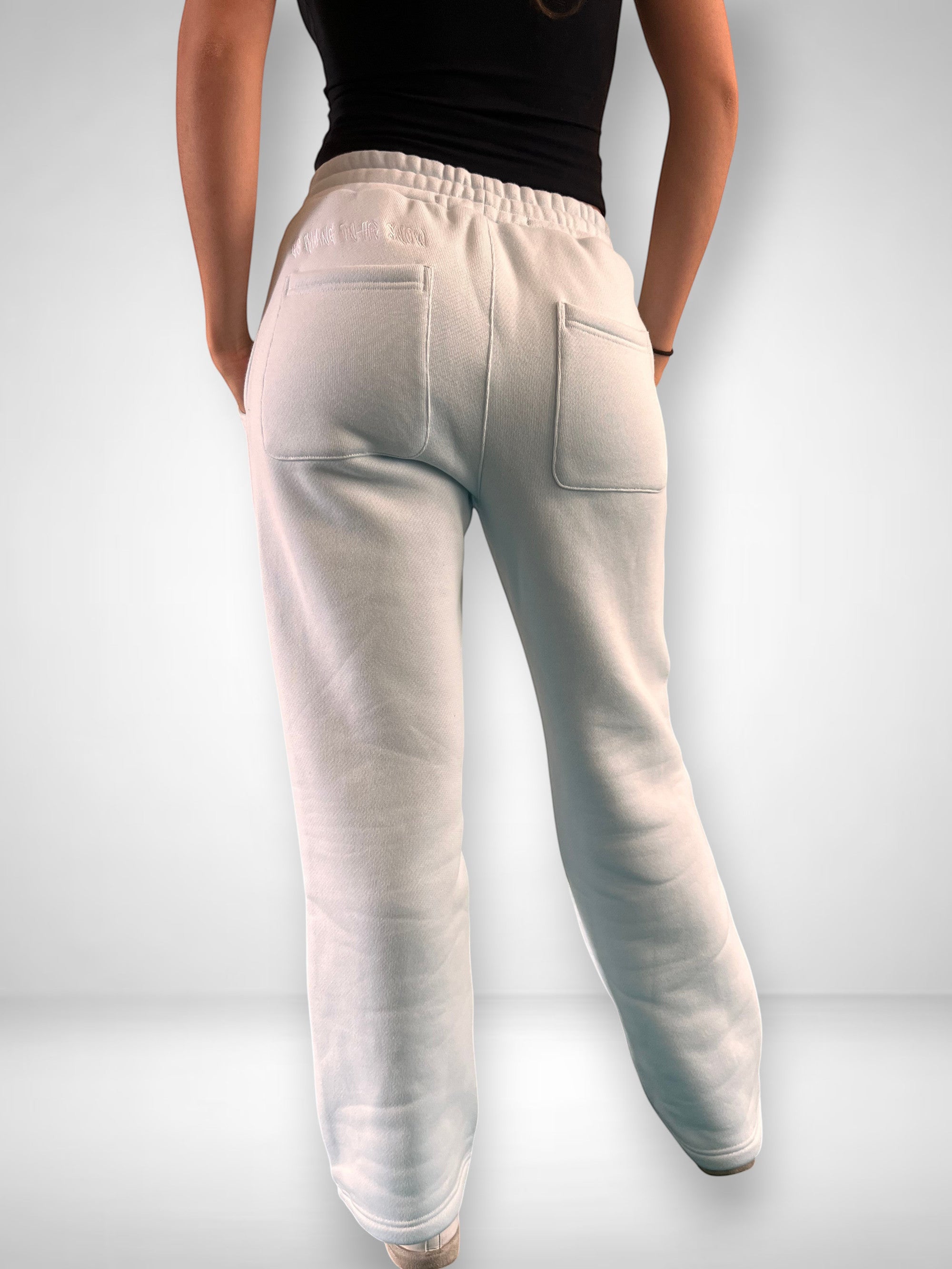 SLAYZ light blue relaxed fit sweatpants with drawstring waist and two back pockets, made from soft fabric.